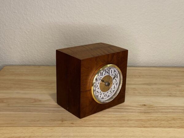 Curly Cube Clock: a small handmade wood clock from the Pacific Northwest, made from exquisite hand-selected hardwoods, a rustic modern, unique gift for any décor, holiday, or occasion. Traditional numeral design with reliable quartz movement. Side view.