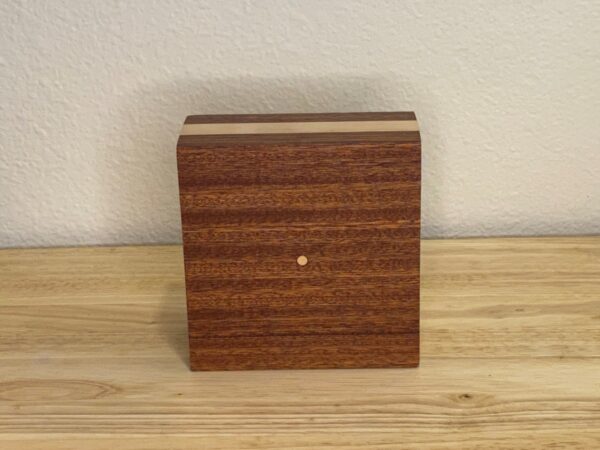 Curly Cube Clock: a small handmade wood clock from the Pacific Northwest, made from exquisite hand-selected hardwoods, a rustic modern, unique gift for any décor, holiday, or occasion. Roman numeral design with reliable quartz movement. Rear view.