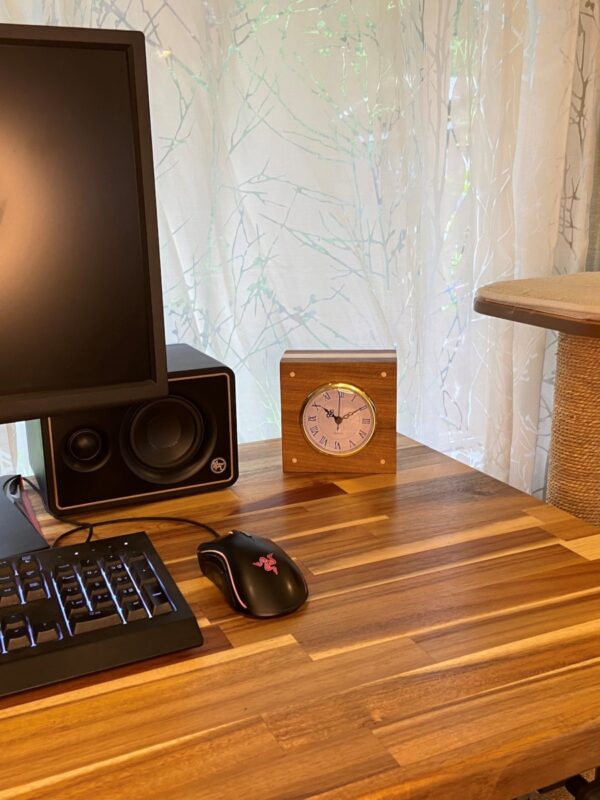 Curly Cube Clock: a small handmade wood clock from the Pacific Northwest, made from exquisite hand-selected hardwoods, a rustic modern, unique gift for any décor, holiday, or occasion. Roman numeral design with reliable quartz movement. Desk view.