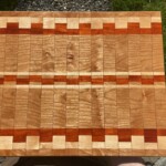 Cherry with Maple and Paduak details.