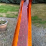Freshly lacquered custom guitar neck with purple heart Custom lacquered guitar neck