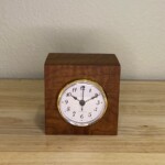 Curly Cube Clock 004 - Arabic Numeral Face Curly Cube Clock: a small handmade wood clock from the Pacific Northwest, made from exquisite hand-selected hardwoods, a rustic modern, unique gift for any décor, holiday, or occasion. Arabic numeral design with reliable quartz movement.