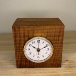 Curly Cube Clock - 001 Curly Cube Clock: a small handmade wood clock from the Pacific Northwest, made from exquisite hand-selected hardwoods, a rustic modern, unique gift for any décor, holiday, or occasion. Arabic numeral design with reliable quartz movement.