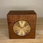 Curly Cube Clock - 002 Curly Cube Clock: a small handmade wood clock from the Pacific Northwest, made from exquisite hand-selected hardwoods, a rustic modern, unique gift for any décor, holiday, or occasion. Roman numeral design with reliable quartz movement.